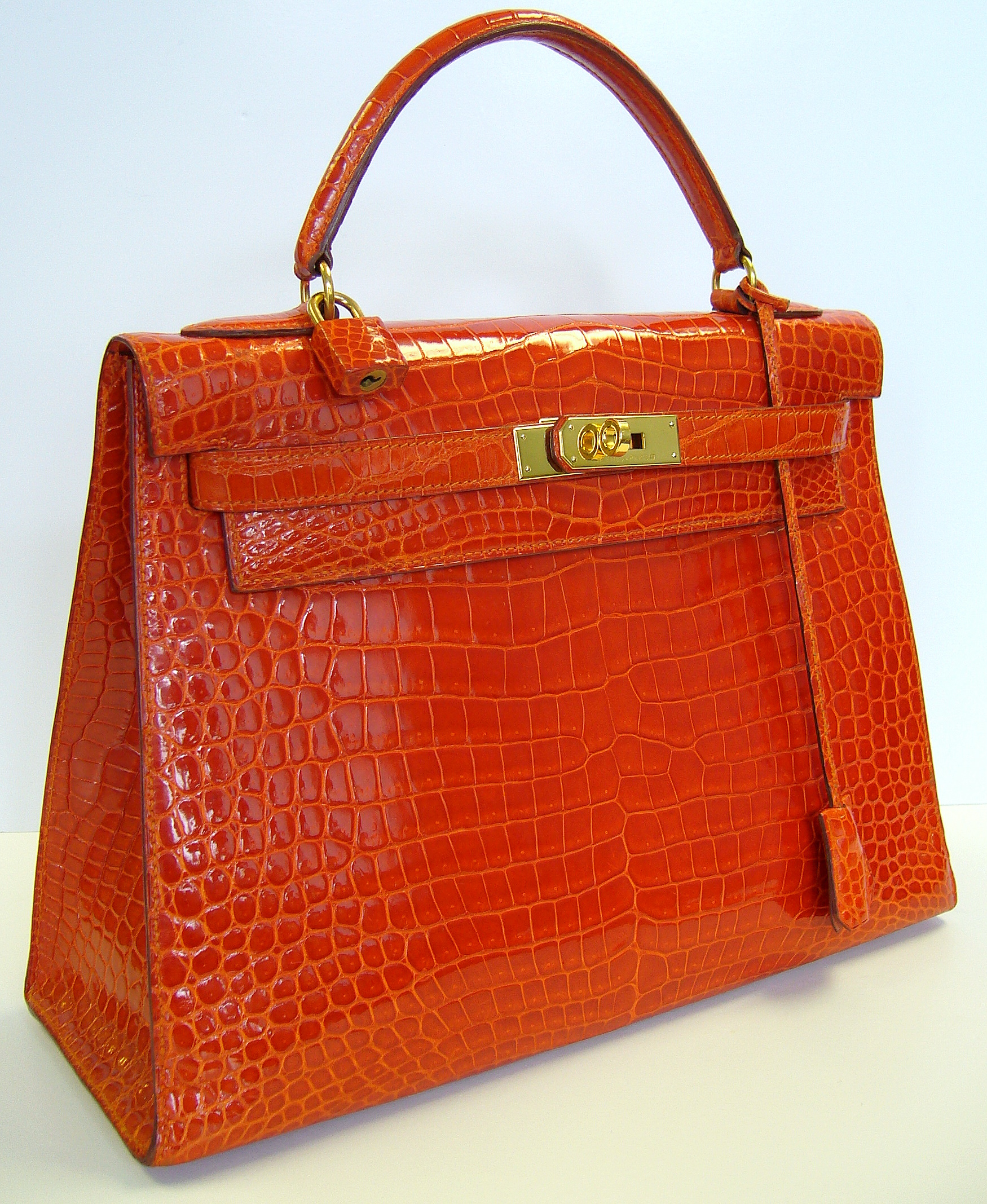 The red birkin crocodile bag is on our stone White birkin crocodile bag