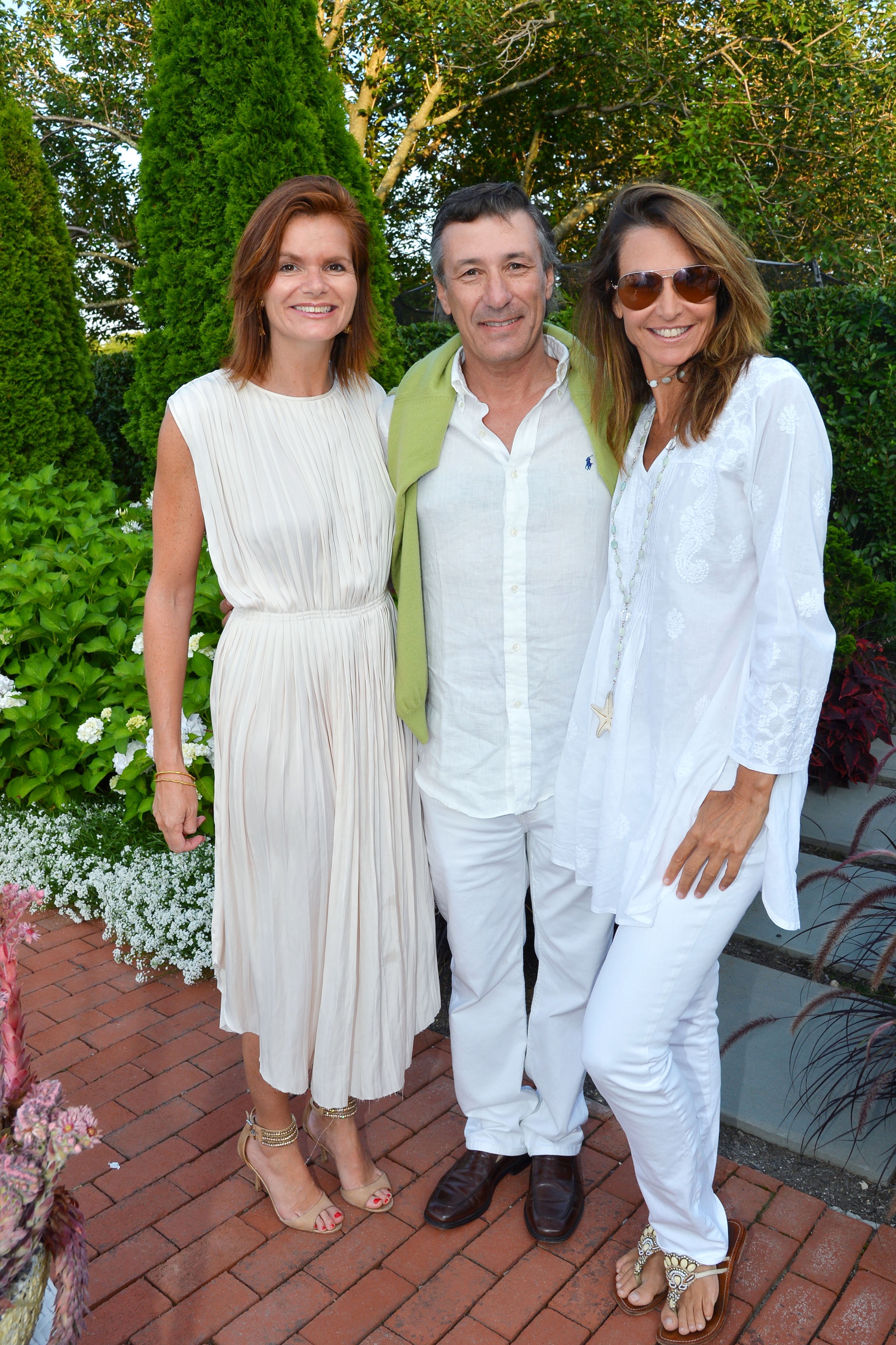 Melissa Green, Nacho Ramos, Whitney Fairchild==Chess in the Schools 2015 Hamptons Cocktail Party==85 Butter Lane, Bridgehampton, NY==July 17, 2015==©Patrick McMullan==Photo - Patrick McMullan/PatrickMcMullan.com====